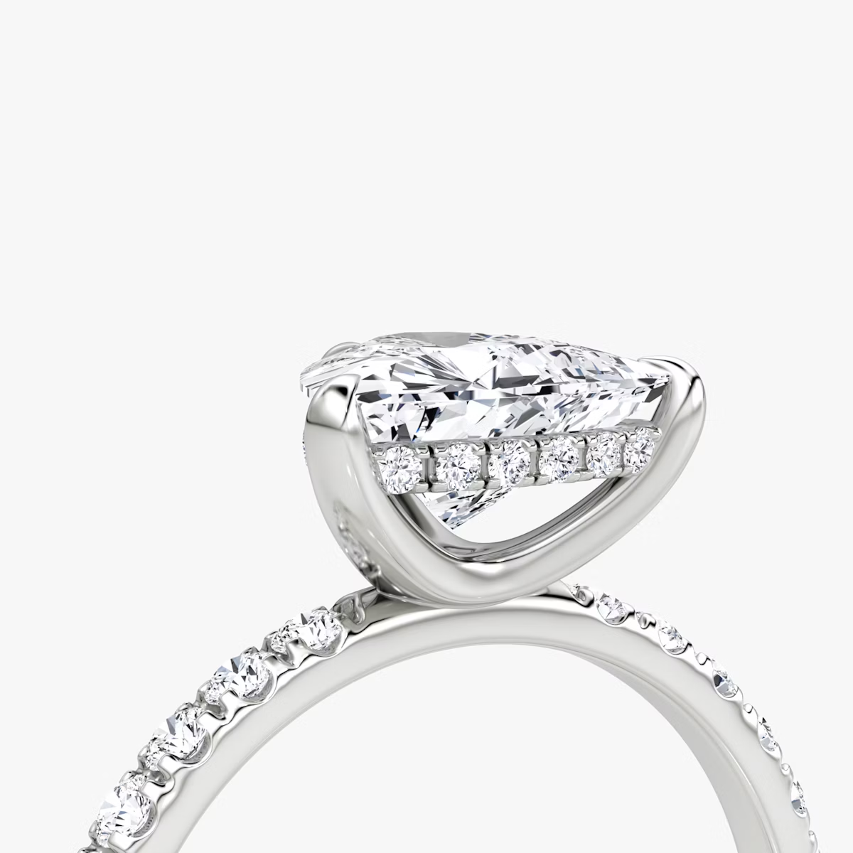 The Classic Hidden Halo Trillion Engagement Ring in Pave Large Band