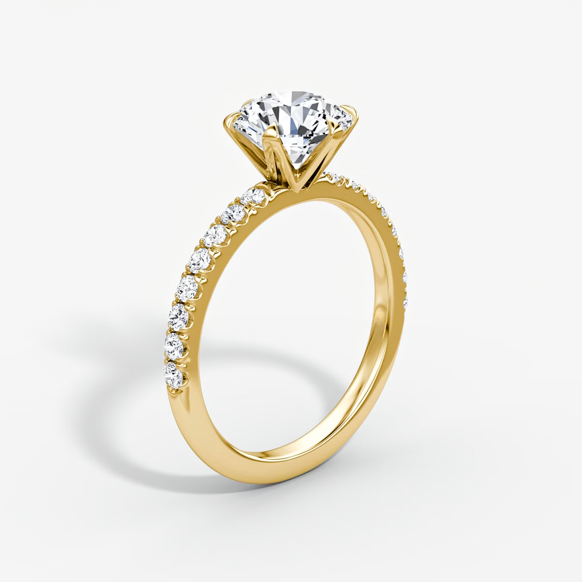 The V Round Brilliant Engagement Ring in Pave Band