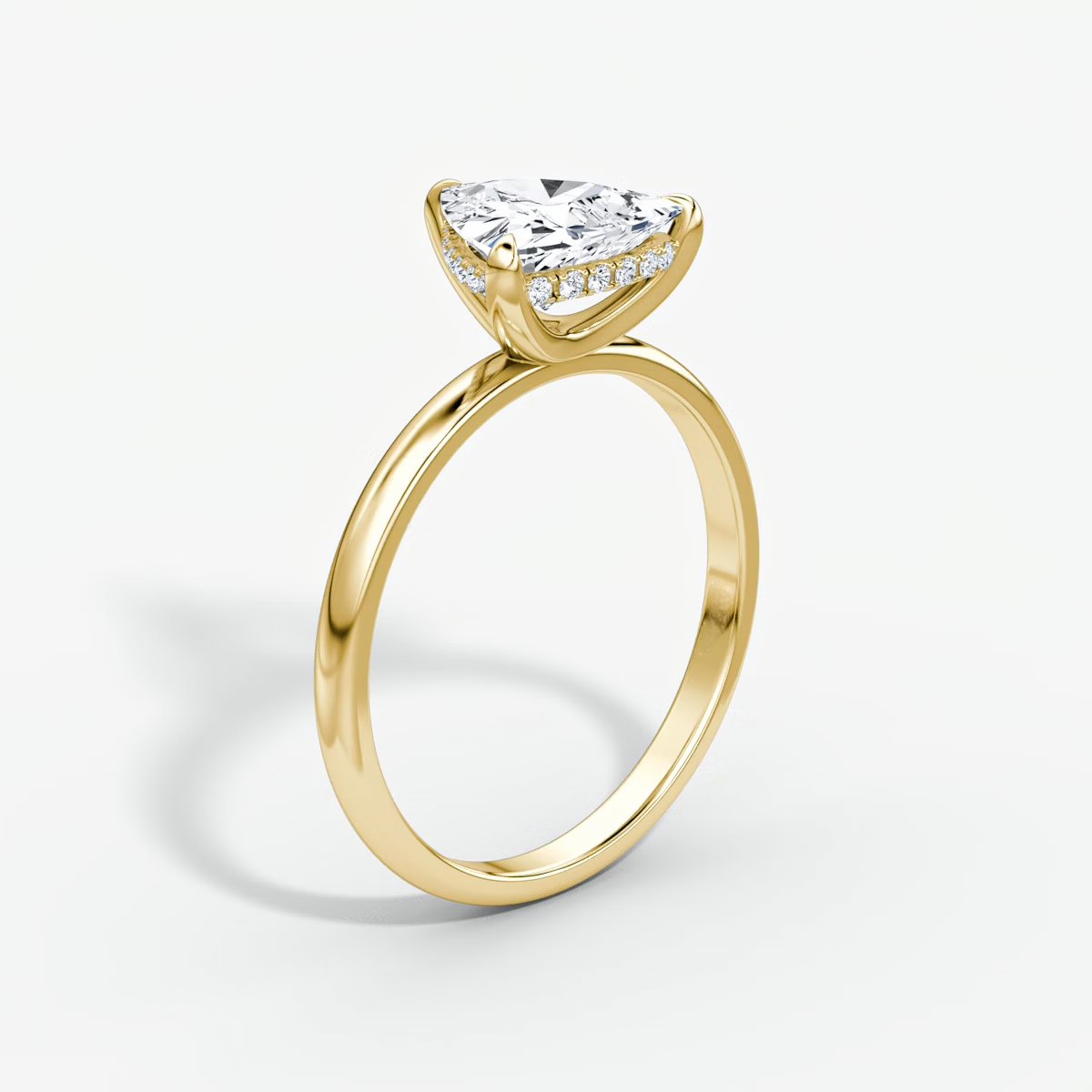 The Classic Hidden Halo Trillion Engagement Ring in Plain Large Band