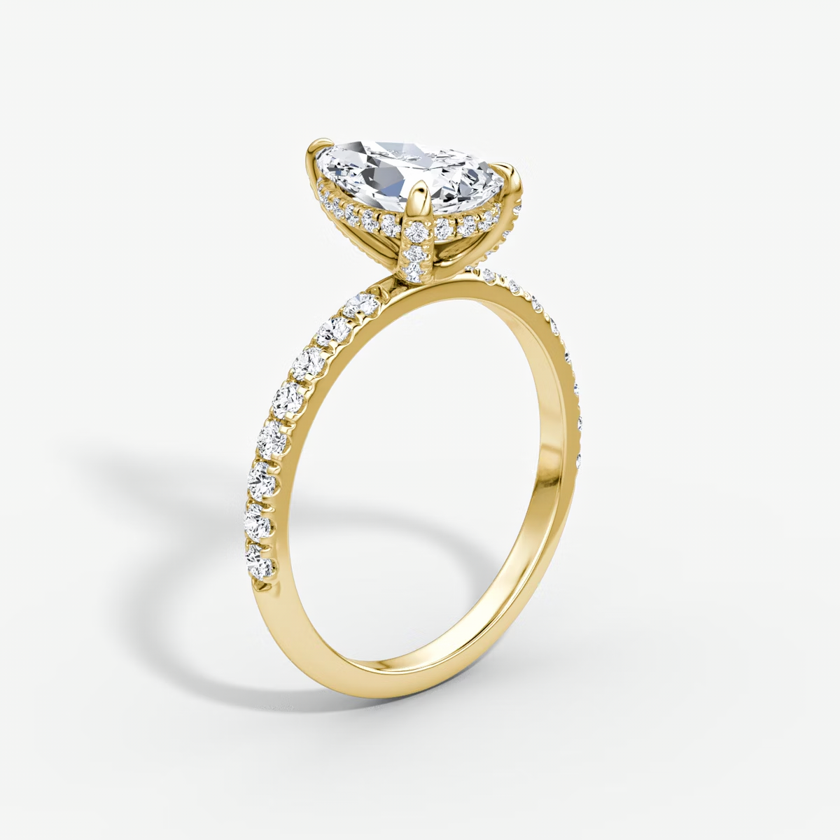 The Classic Hidden Halo Pear Engagement Ring in Pave Large Band