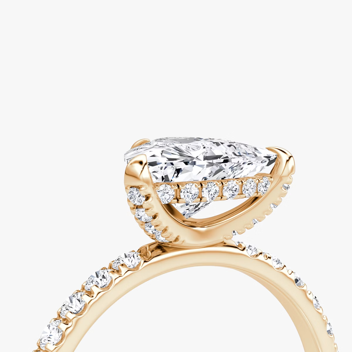 The Classic Hidden Halo Trillion Engagement Ring in Pave Standard Band