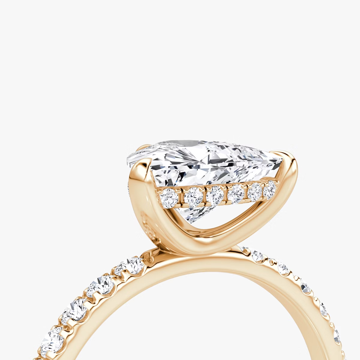 The Classic Hidden Halo Trillion Engagement Ring in Pave Standard Band