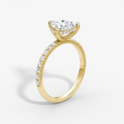 The Classic Hidden Halo Trillion Engagement Ring in Pave Standard Band