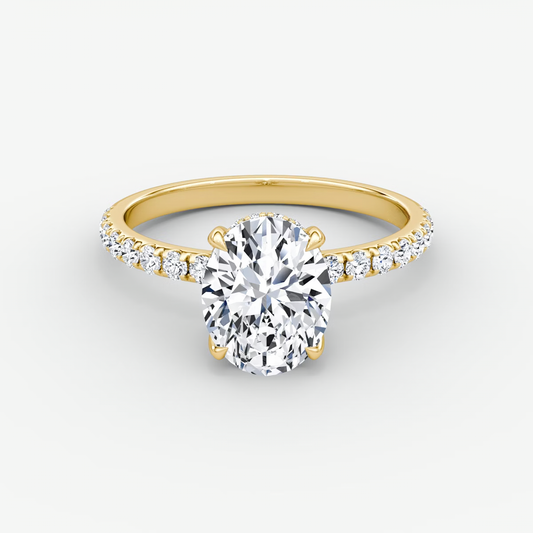 The Classic Hidden Halo Oval Engagement Ring in Pave Standard Band